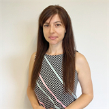 Anife Dodumova, Real estate agent