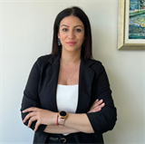 Romina Dimitrova, Real estate agent